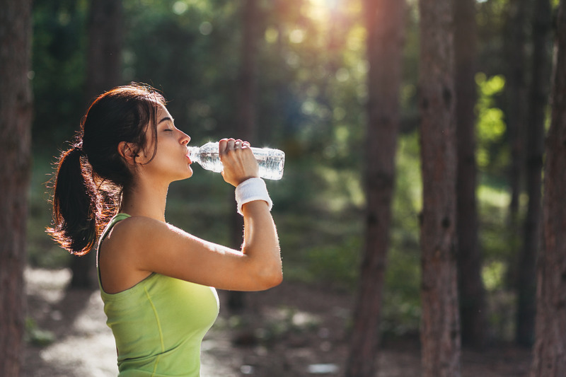 Patient drinking to avoid dehydration